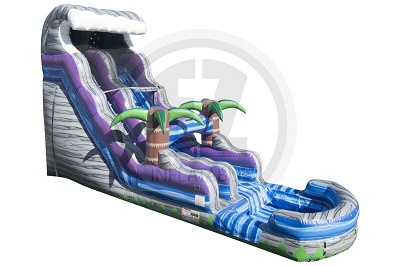Angled view of the water slide exterior. Shaped in a wave theme with a two palm trees in the middle of the slide.